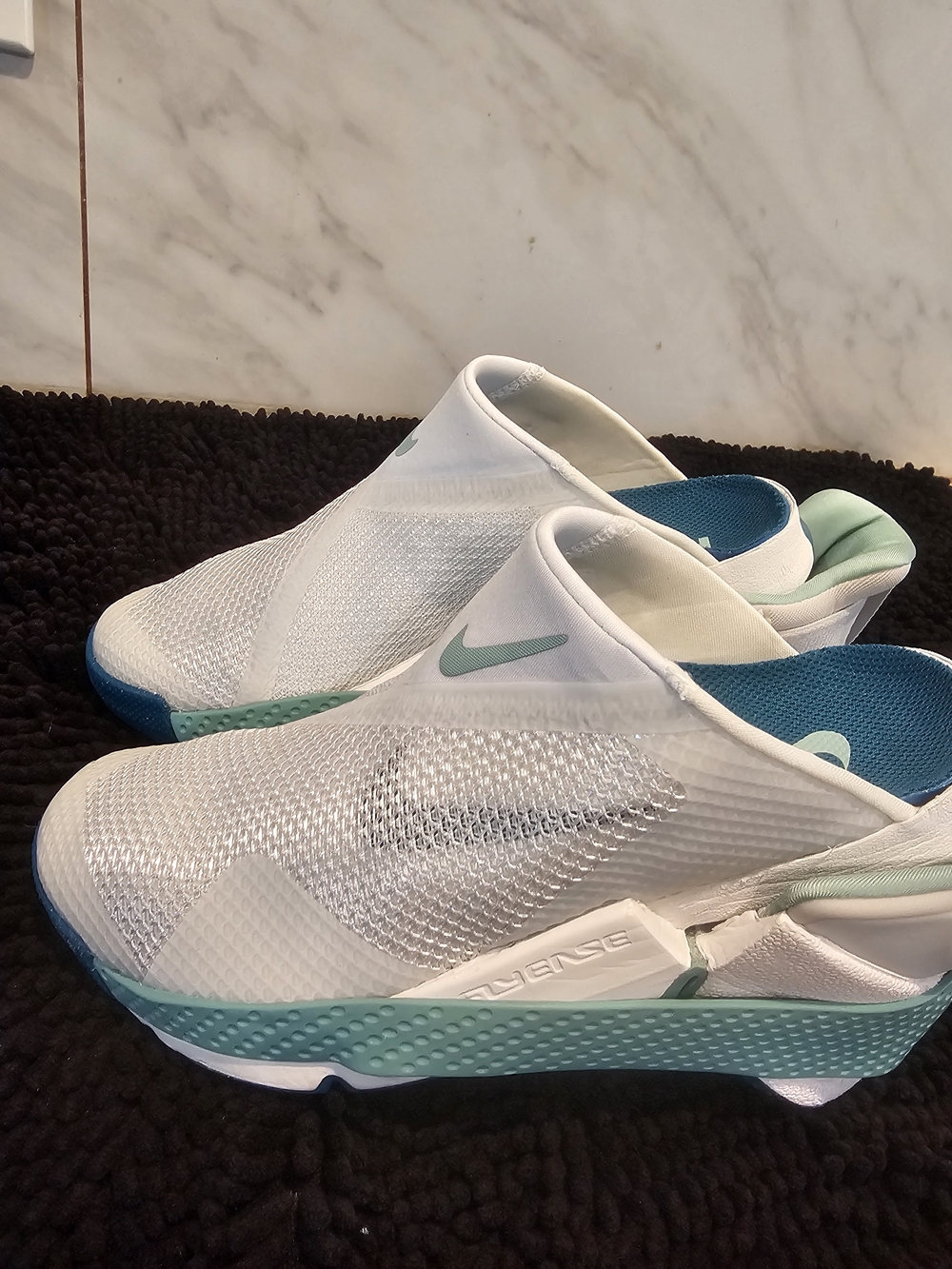 Nike Women’s White & Teal Slip-On Athletic Shoes